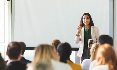 Teacher lecturing students